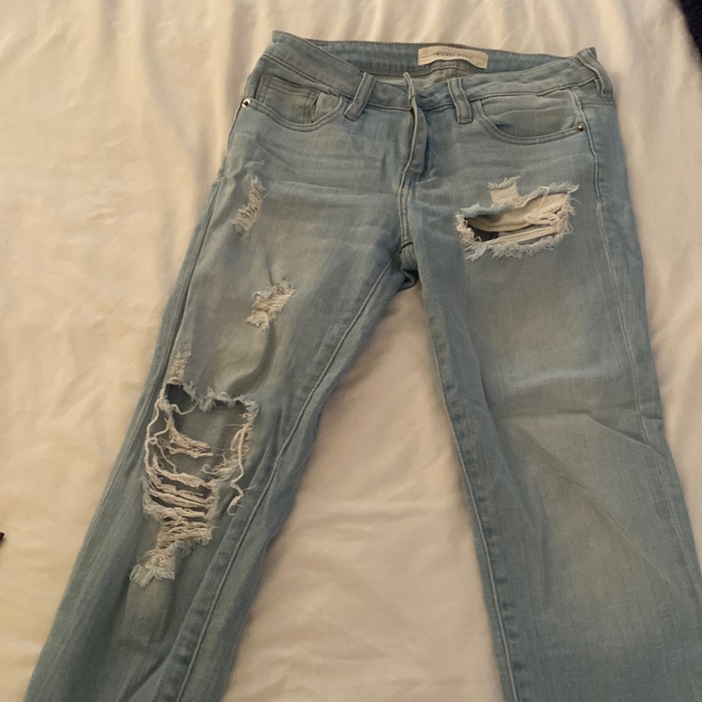 Ripped light blue ripped boyfriend jeans